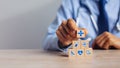 Hand arranging wood block stacking with icon healthcare medical, Insurance for your health medical, Insurance for your health