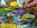 The hand of artist with a paintbrush Royalty Free Stock Photo