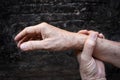 Hand of Asian elder man. Concept of joint pain, arthritis or hand problems Royalty Free Stock Photo