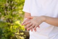 Hand of Asian woman rubbing after applying the hand sanitizer. Safe step after getting the alcohol gel and wait for it to dry