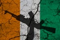 Hand assault rifle on the background of the flag of Ireland and cracks. Ireland Power Concept