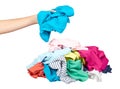 Hand with assorted clothes, loundry housework. Isolated Royalty Free Stock Photo