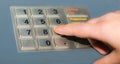 Hand and ATM keypad Royalty Free Stock Photo