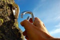 Hand attaching carabiner Royalty Free Stock Photo