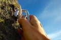 Hand attaching carabiner Royalty Free Stock Photo