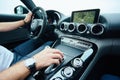 Hand on automatic gear shift, Man hand shifting an automatic car Royalty Free Stock Photo