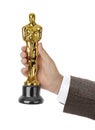 Hand with Award of Oscar ceremony Royalty Free Stock Photo