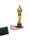 Hand with Award of Oscar ceremony Royalty Free Stock Photo