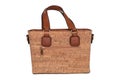 Hand bag isolated. Fashionable brown female luxury women bag made from oak cork isolated on a white background. Womans