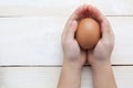 Hand balancing eggs chicks are born