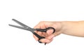 The hand of a Barber holding a scissors for thinning out hair on Royalty Free Stock Photo