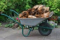 Hand barrow with splitted firewood