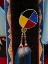 Yellow, Red, Blue, and Black Seed Bead Medallion on Pow Wow Regalia Royalty Free Stock Photo