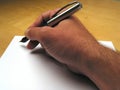 Hand beginning to write