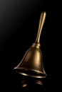 Hand Bell isolated on a black background Royalty Free Stock Photo