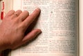 Hand and bible