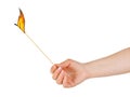 Hand with big burning match Royalty Free Stock Photo