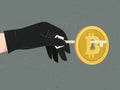 Hand with black glove using key to open Bitcoin, hacker hacking Bitcoin security system