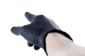 Hand in black latex protective glove pointing at something with a finger away from the camera, gesture closeup, isolated on white Royalty Free Stock Photo