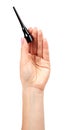 Hand with black liquid pencil, eye makeup brush Royalty Free Stock Photo