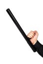 Hand in black shirt with black rubber police baton isolated on white background