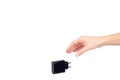 Hand with black USB wall chrger plug, three ports Royalty Free Stock Photo