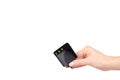 Hand with black USB wall chrger plug, three ports Royalty Free Stock Photo