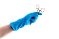 Hand in blue glove holding dental metal stick isolated Royalty Free Stock Photo