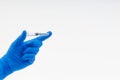 Hand in a blue glove holding syringe Royalty Free Stock Photo