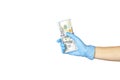 Hand in blue medical glove holding money on white background. Cropped Hand in blue medical glove Hold Paper Currencies On White