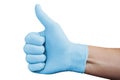 Hand in blue medical glove showing approval thumbs up sign isolated on white background Royalty Free Stock Photo