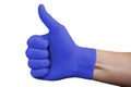 Hand in blue medical glove showing approval thumbs up sign isolated on white background Royalty Free Stock Photo