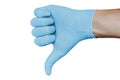 Hand in blue medical glove showing disapproval thumbs down sign isolated on white background Royalty Free Stock Photo