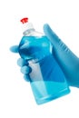 Hand with bottle of blue dish washing liquid