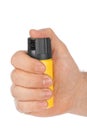 Hand with bottle of pepper spray Royalty Free Stock Photo