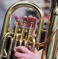 Hand of boy plays the trombone in the brass band Royalty Free Stock Photo