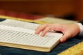 Hand of boy reading the Jewish Torah at Bar Mitzvah Royalty Free Stock Photo