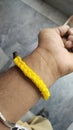 Hand braslet yellow colour Royalty Free Stock Photo
