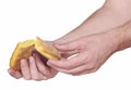 Hand breaking apart a bread Royalty Free Stock Photo