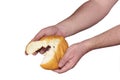 Hand breaking apart a bread Royalty Free Stock Photo