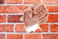 Hand breaking through wall Royalty Free Stock Photo