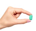 Hand with bright chewing gum, dental bubblegum Royalty Free Stock Photo