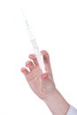 Hand brings syringe