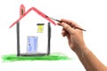 Hand with brush drawing a house Royalty Free Stock Photo