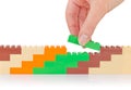 Hand build wall of colour toy block Royalty Free Stock Photo