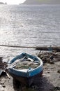 Hand built native fishing boat on shore bequia