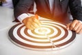 Hand business put a dart hit on the target,Goal target concept Royalty Free Stock Photo
