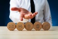 Five wooden circles with contact and information icons on them Royalty Free Stock Photo