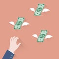 Hand businessman trying to grab Money Flying Away Royalty Free Stock Photo
