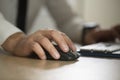 Hand of businessman use computer mouse and typing, partnership a Royalty Free Stock Photo
